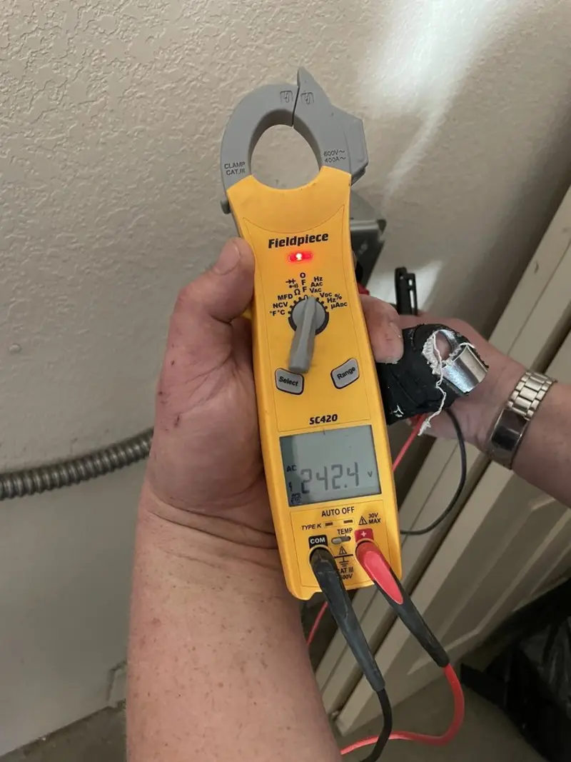 Voltage testing with clamp meter during Ceiling Fan Installation in Murphysboro